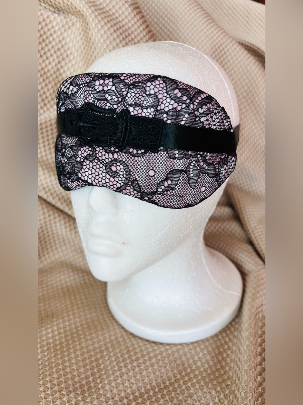 Embroidered Buckle Over a Lace-Overlay Pink / Black Sleep Mask with Black Ribbon